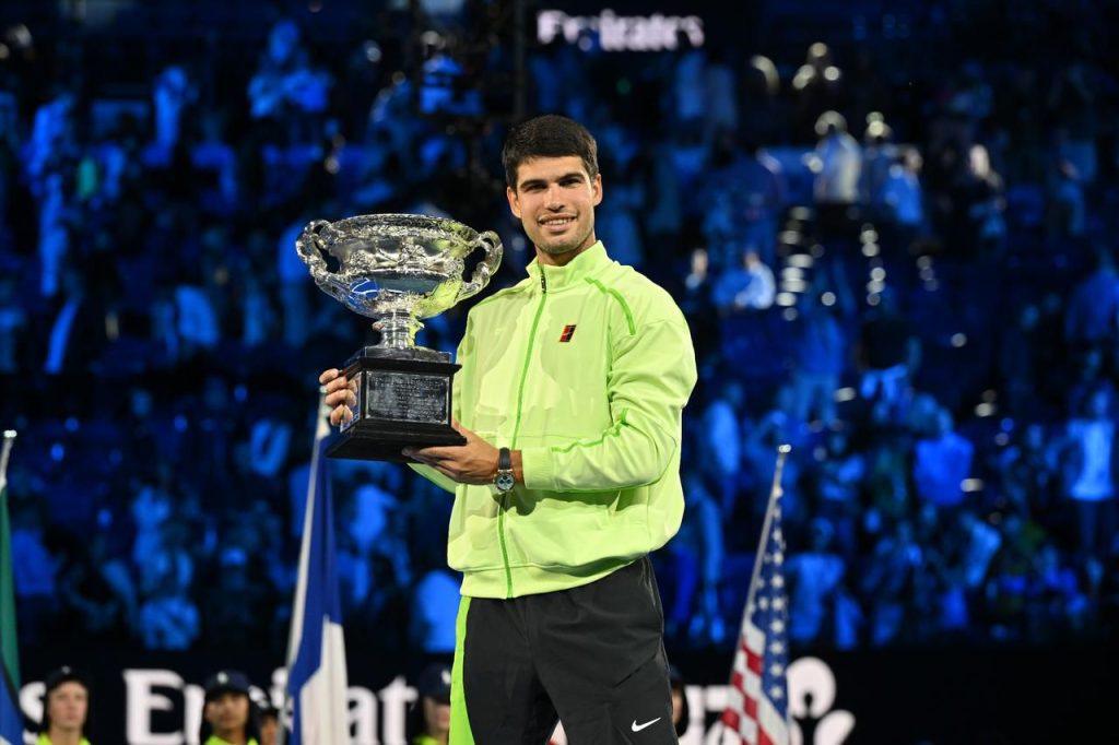 Carlos Alcaraz celebrating 2026 Australian Open victory after completing career Grand Slam