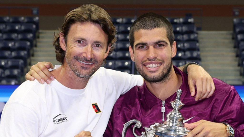 Tennis Coach, Ferrero smiling with tennis champion, Carlos Alcaraz