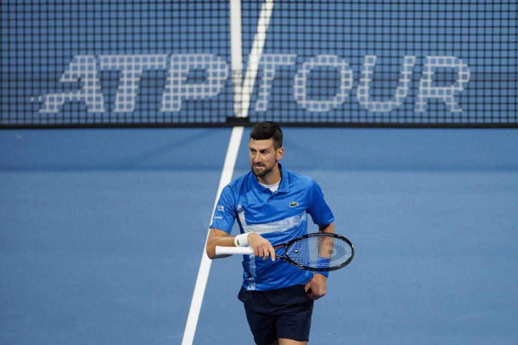 Novak Djokovic in action during a professional tennis match on hard court